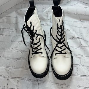 Brand new white combat boots. Size 9 1/2 women’s.
